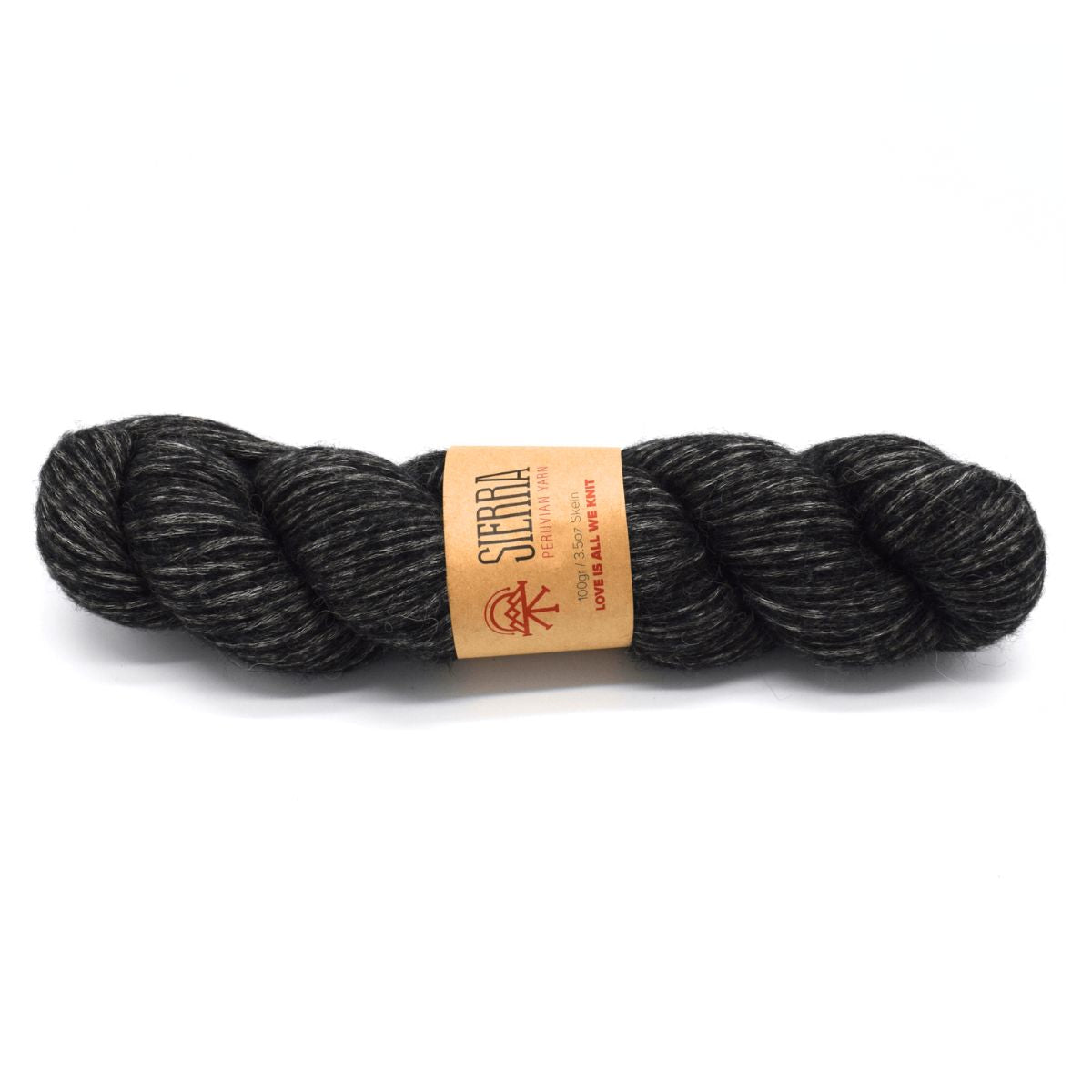 Charcoal skein of yarn for hand knitting with a sierra yarn label on a white background