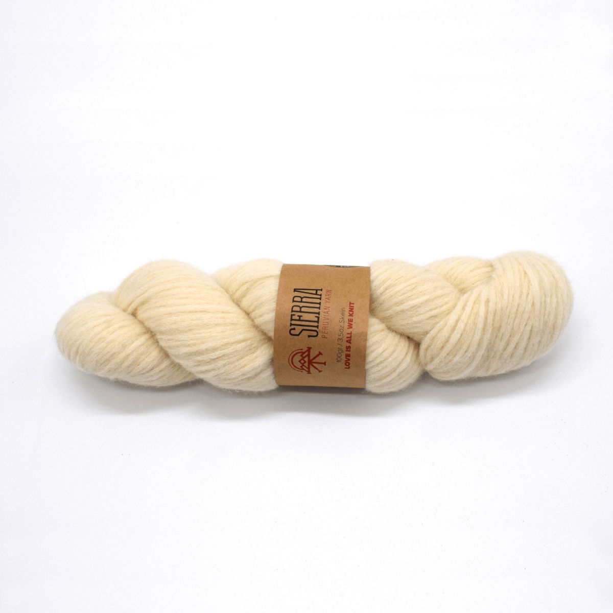 Ivory skein of yarn for hand knitting with a sierra yarn label on a white background