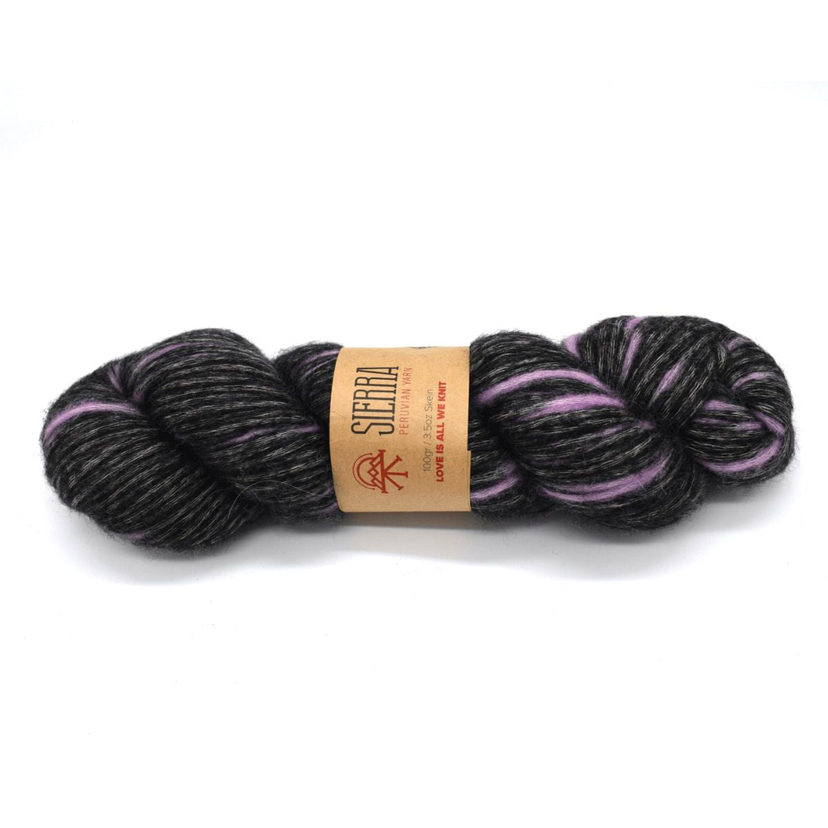 Black and purple yarn skein with a label on a white background