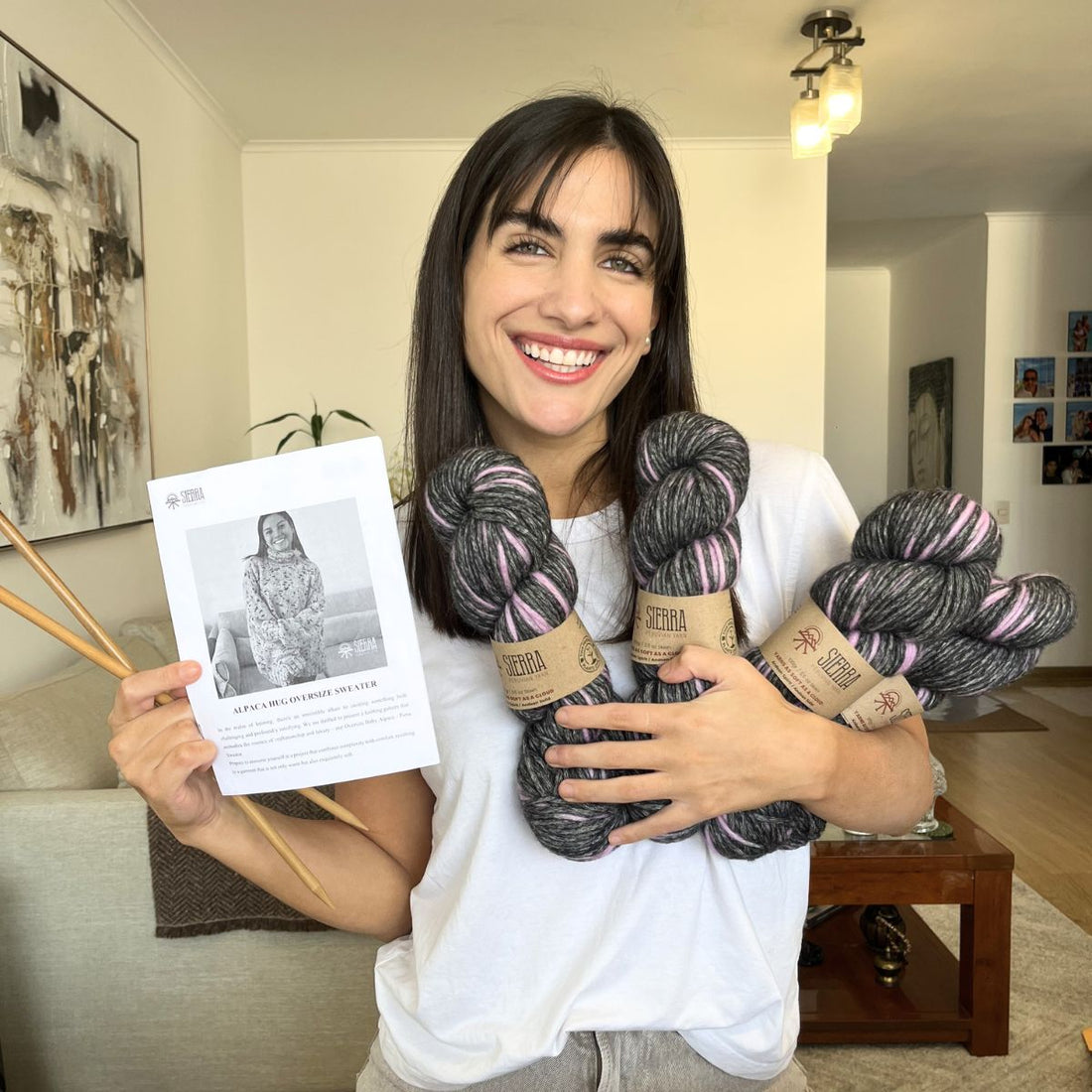 Woman showing her first knitting kit