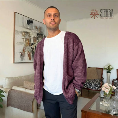 Man wearing Nomad Cardigan Knitting Kit in Burgundi Baby Alpaca Pima Cotton Cloudtouch Blend