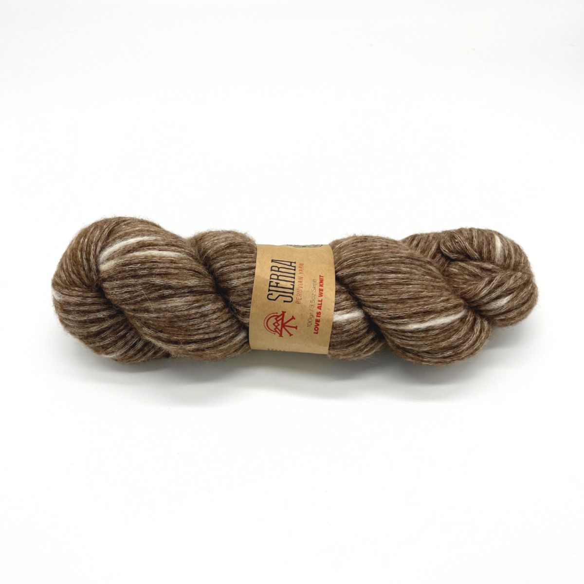 Brown skein of yarn with a label on a white background